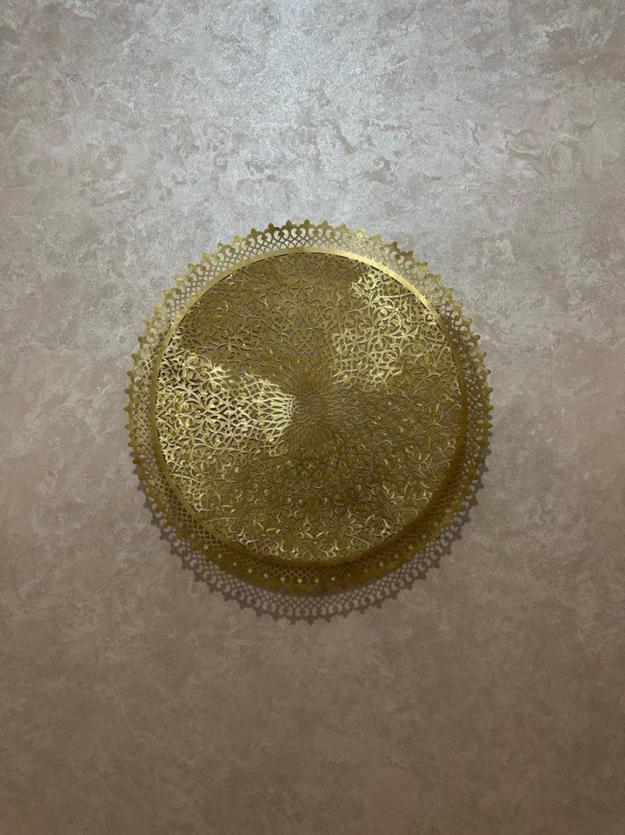 Round Filigree Brass Wall Light with intricate hand-perforated brass design