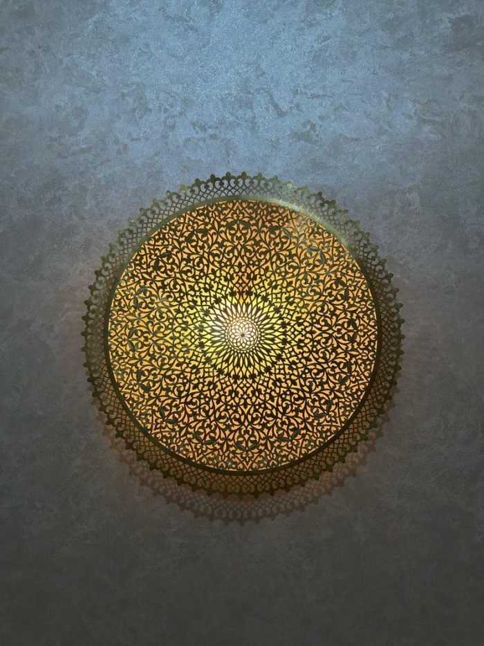 Round Filigree Brass Wall Light with intricate hand-perforated brass design