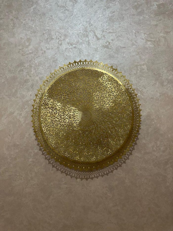 Round Filigree Brass Wall Light with intricate hand-perforated brass design